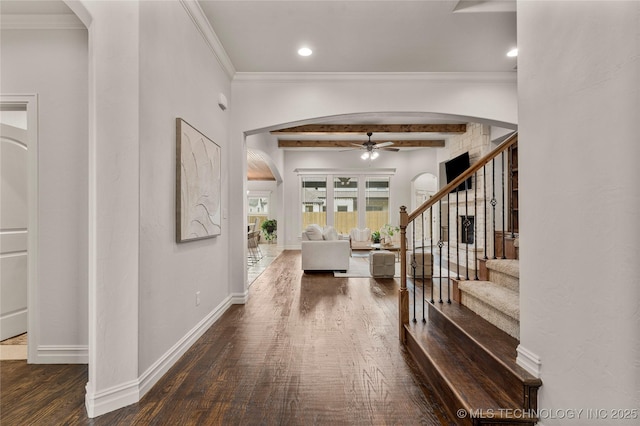 5314 E 125th St S, Bixby, OK 74008 - foyer entrance featuring a ceiling fan, arched walkways, wood finished floors, beamed ceiling, and stairs