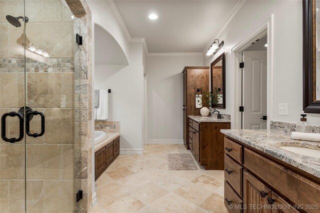 5314 E 125th St S, Bixby, OK 74008 - full bath featuring a shower stall, two vanities, a bath, ornamental molding, and baseboards