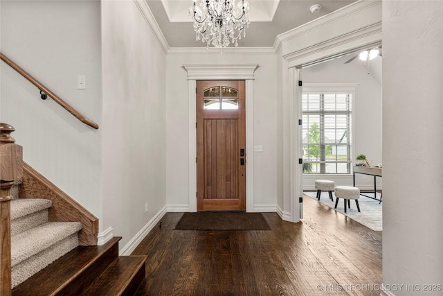 5314 E 125th St S, Bixby, OK 74008 - entrance foyer featuring dark wood-style flooring, stairs, baseboards, a chandelier, and crown molding