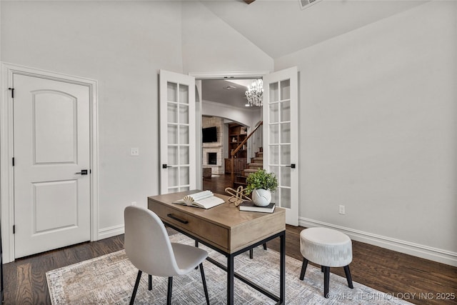 5314 E 125th St S, Bixby, OK 74008 - office featuring baseboards, wood finished floors, arched walkways, high vaulted ceiling, and french doors