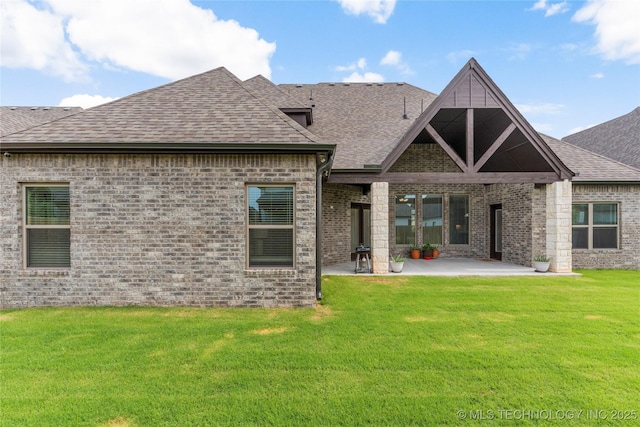 5314 E 125th St S, Bixby, OK 74008 - back of property with a shingled roof, a patio, a yard, and brick siding