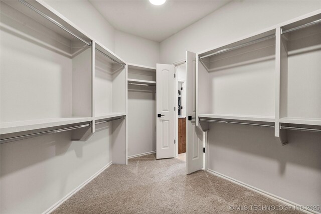 5314 E 125th St S, Bixby, OK 74008 - walk in closet featuring carpet flooring