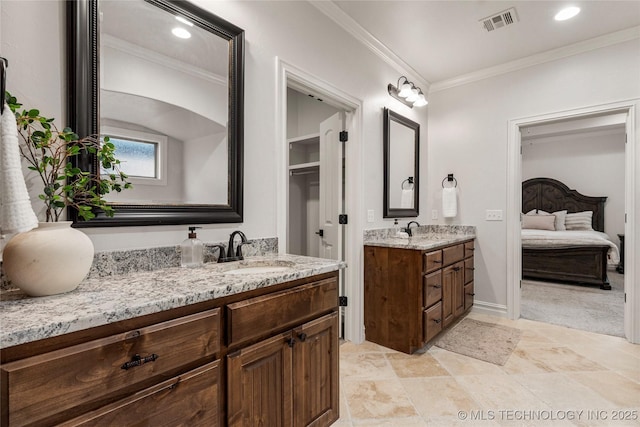 5314 E 125th St S, Bixby, OK 74008 - bathroom with ornamental molding, two vanities, and ensuite bath