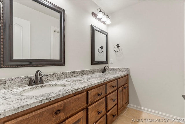 5314 E 125th St S, Bixby, OK 74008 - full bathroom featuring double vanity, baseboards, and tile patterned floors