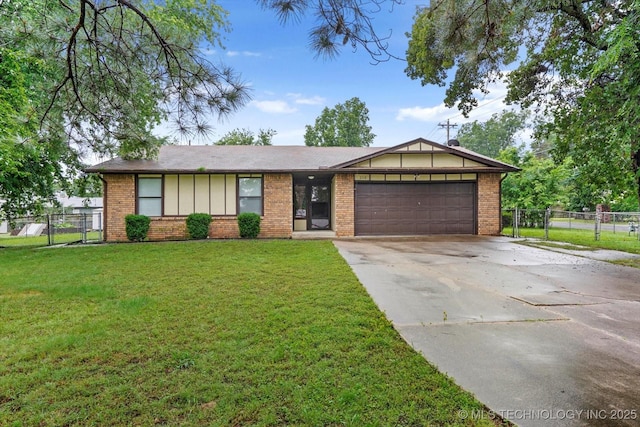 32112 E 721st Rd, Wagoner, OK 74467 - view of front of home with a garage, concrete driveway, and brick siding