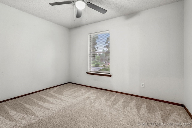 32112 E 721st Rd, Wagoner, OK 74467 - carpeted spare room with a textured ceiling, a ceiling fan, and baseboards