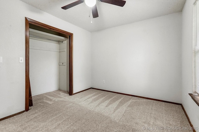 32112 E 721st Rd, Wagoner, OK 74467 - unfurnished bedroom featuring light colored carpet, ceiling fan, and baseboards