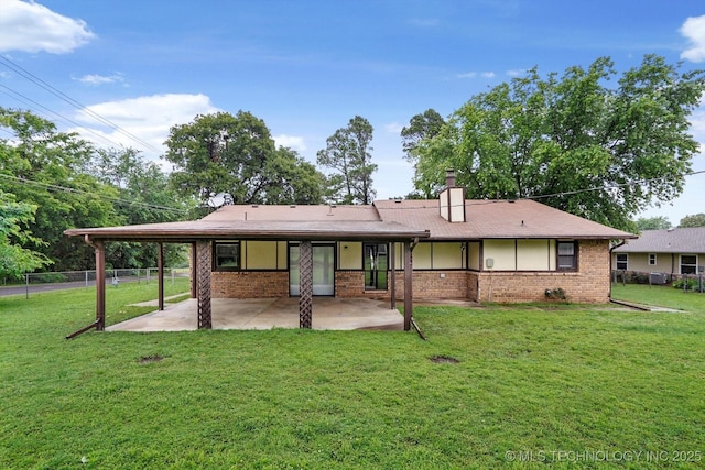 32112 E 721st Rd, Wagoner, OK 74467 - rear view of house with a patio area, brick siding, and a chimney