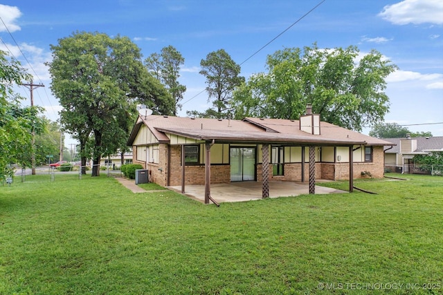 32112 E 721st Rd, Wagoner, OK 74467 - back of house featuring central AC unit, a patio, brick siding, and a chimney