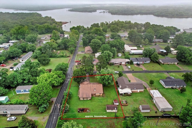 32112 E 721st Rd, Wagoner, OK 74467 - aerial perspective of suburban area with a nearby body of water and property boundaries highlighted