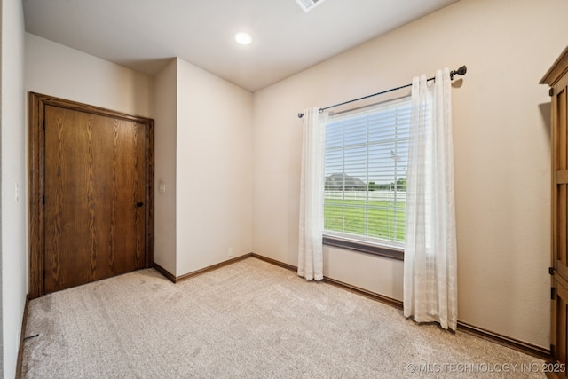 21 E 171st St S, Glenpool, OK 74033 - unfurnished bedroom with light colored carpet, baseboards, and recessed lighting