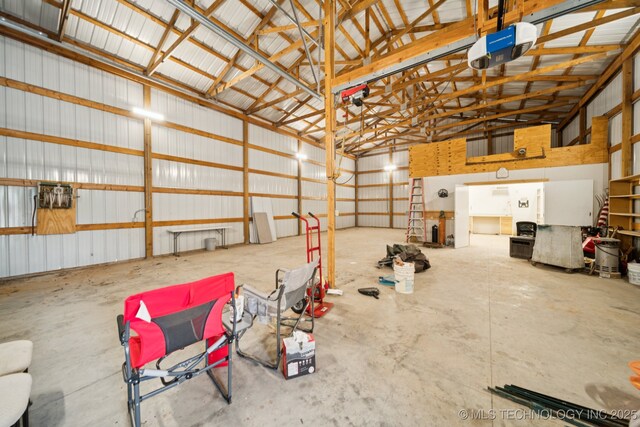 21 E 171st St S, Glenpool, OK 74033 - garage with a garage door opener and metal wall