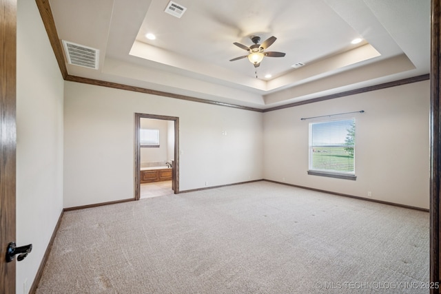21 E 171st St S, Glenpool, OK 74033 - spare room featuring a tray ceiling, light carpet, a ceiling fan, and recessed lighting