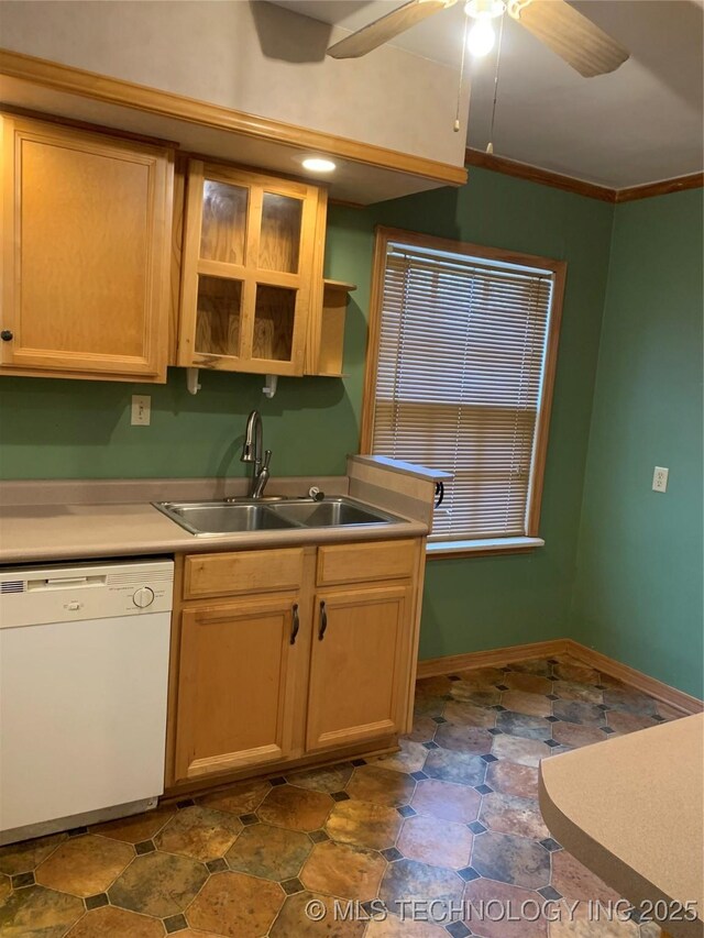 141 N College Ave, Tulsa, OK 74110 - kitchen with white dishwasher, a ceiling fan, glass insert cabinets, and light countertops