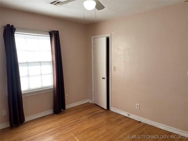 141 N College Ave, Tulsa, OK 74110 - empty room featuring ceiling fan and light wood-style flooring