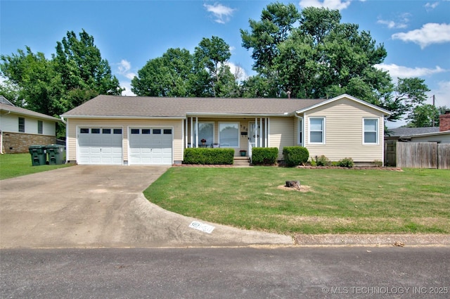120 S Camden St, Muskogee, OK 74403 - ranch-style house featuring a garage, driveway, and a porch