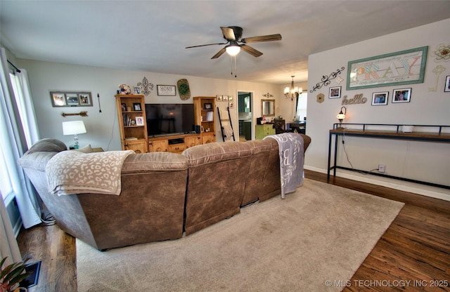 120 S Camden St, Muskogee, OK 74403 - living room featuring ceiling fan, a chandelier, and wood finished floors