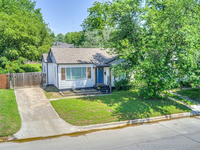 3215 W 41st St, Tulsa, OK 74107 - view of front of property featuring a gate, roof with shingles, and concrete driveway
