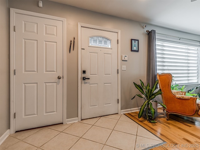 3215 W 41st St, Tulsa, OK 74107 - entrance foyer featuring light tile patterned floors and baseboards