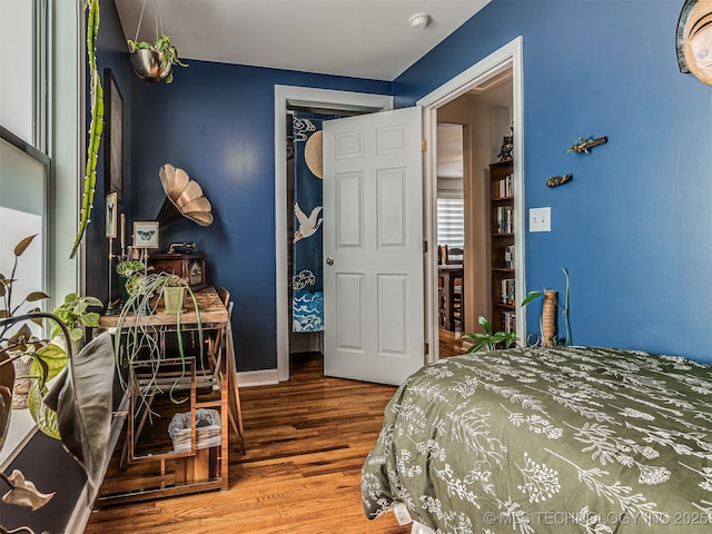 3215 W 41st St, Tulsa, OK 74107 - bedroom with wood finished floors and baseboards