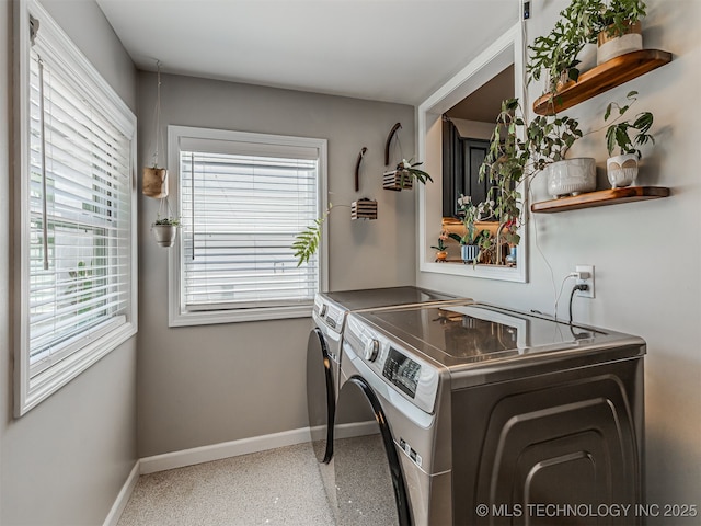 3215 W 41st St, Tulsa, OK 74107 - washroom featuring washer and dryer, baseboards, and healthy amount of natural light