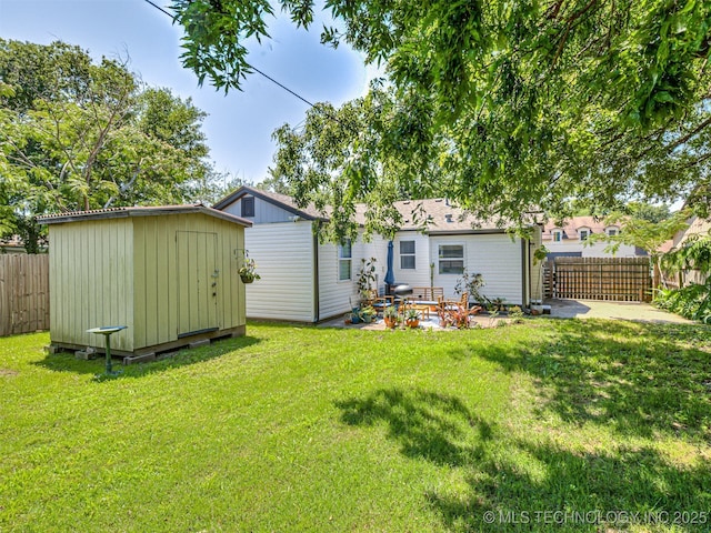 3215 W 41st St, Tulsa, OK 74107 - rear view of property featuring a patio area and board and batten siding