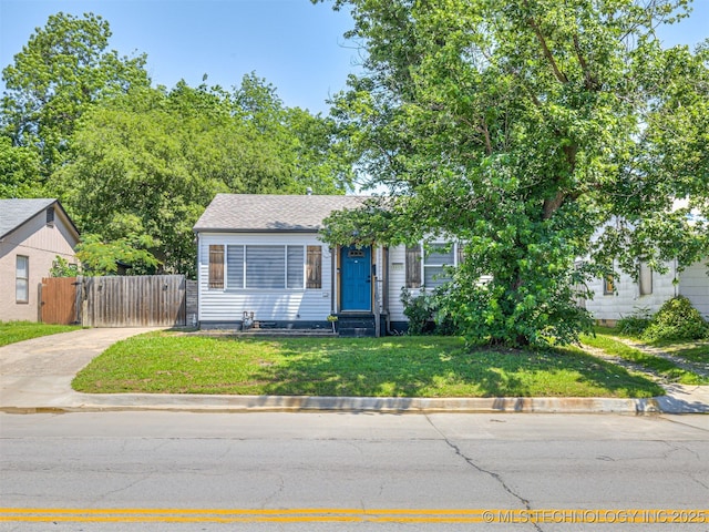 3215 W 41st St, Tulsa, OK 74107 - view of property hidden behind natural elements featuring a gate and driveway