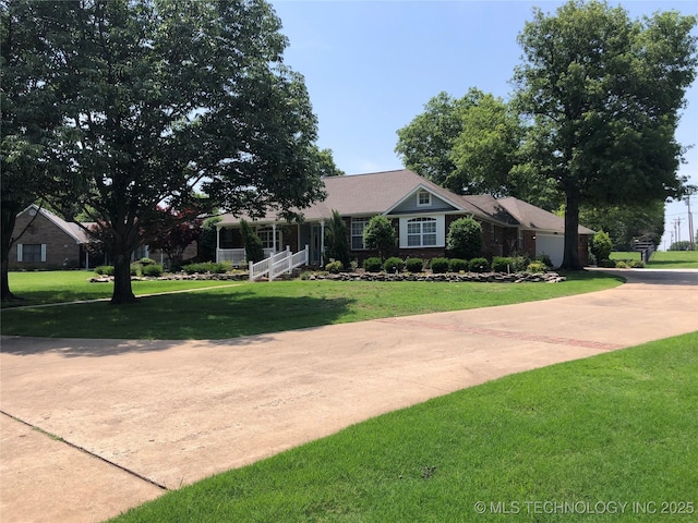 17704 E 92nd St, Owasso, OK 74055 - single story home featuring a front yard and concrete driveway