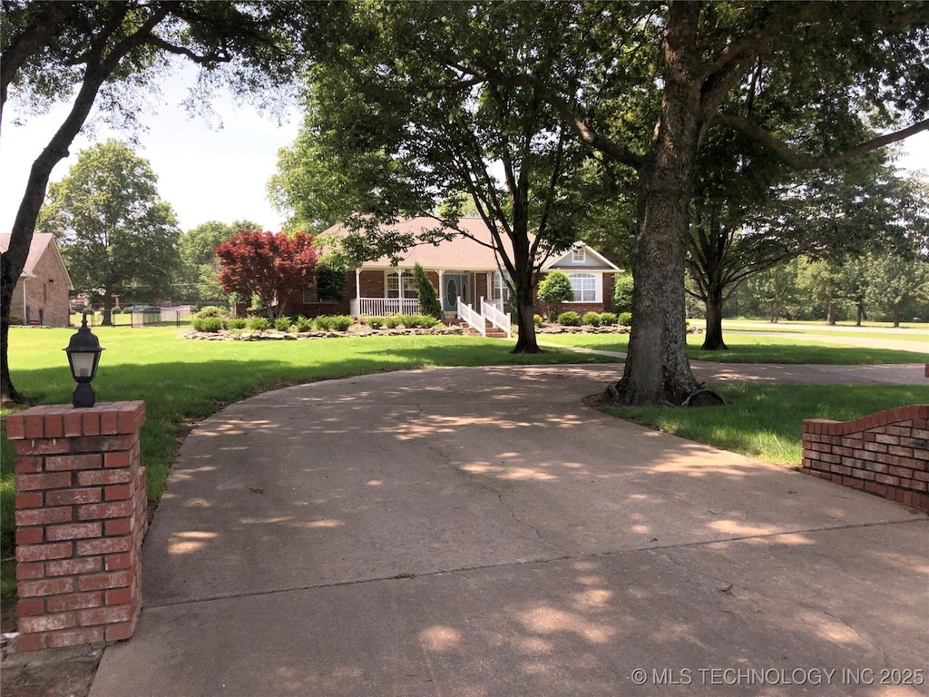 17704 E 92nd St, Owasso, OK 74055 - view of community featuring a lawn