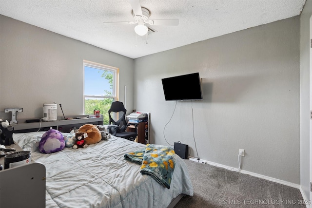 4211 E 101st St N, Sperry, OK 74073 - carpeted bedroom with baseboards, a textured ceiling, and ceiling fan