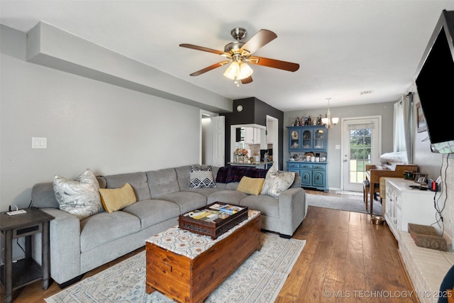 4211 E 101st St N, Sperry, OK 74073 - living room featuring ceiling fan and dark wood-type flooring
