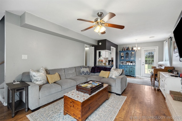 4211 E 101st St N, Sperry, OK 74073 - living area featuring ceiling fan and dark wood-type flooring