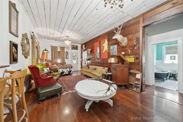 528 S Muskogee, Tahlequah, OK 74464 - living room with wooden walls, hardwood / wood-style floors, and wood ceiling