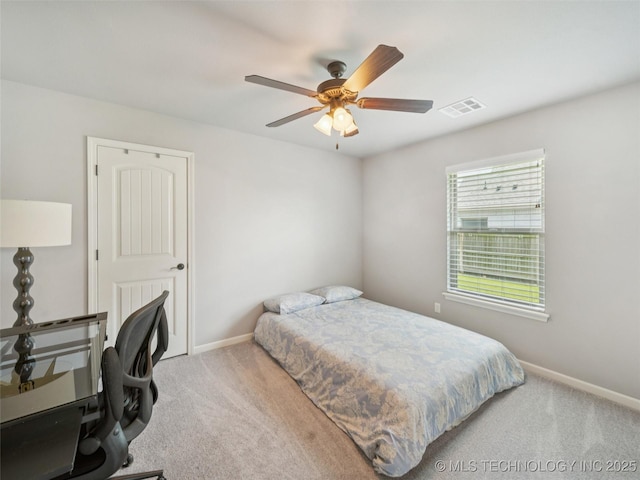 12909 S First St, Jenks, OK 74037 - bedroom featuring carpet, baseboards, ceiling fan, and an office area