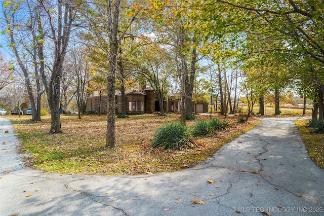 11601 S 193rd E Ave, Broken Arrow, OK 74014 - view of community featuring driveway