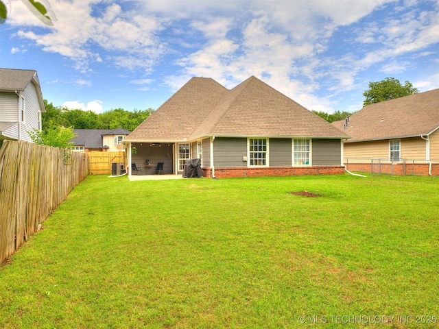 12411 E 90th St N, Owasso, OK 74055 - rear view of property with cooling unit, a patio, roof with shingles, and brick siding