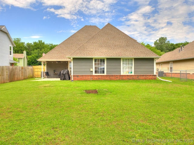 12411 E 90th St N, Owasso, OK 74055 - back of house with central AC unit and a patio