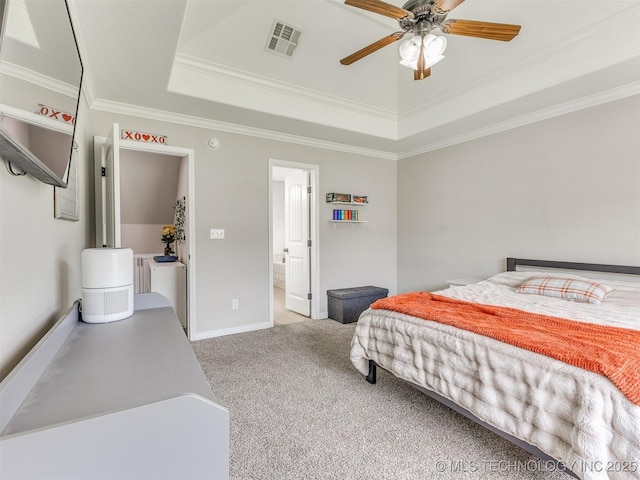 12411 E 90th St N, Owasso, OK 74055 - carpeted bedroom with a raised ceiling, crown molding, ensuite bathroom, baseboards, and a ceiling fan