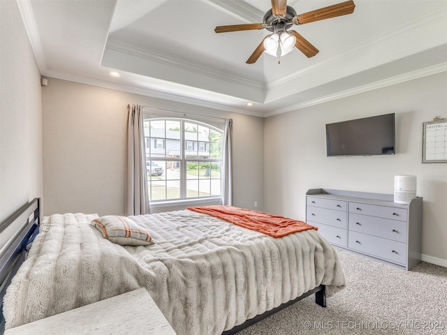 12411 E 90th St N, Owasso, OK 74055 - carpeted bedroom with a tray ceiling, crown molding, recessed lighting, a ceiling fan, and baseboards