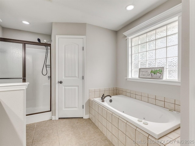 12411 E 90th St N, Owasso, OK 74055 - bathroom with a shower stall, a tub with jets, tile patterned flooring, and recessed lighting