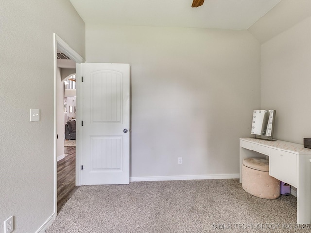 12411 E 90th St N, Owasso, OK 74055 - unfurnished bedroom with carpet, baseboards, ceiling fan, and vaulted ceiling