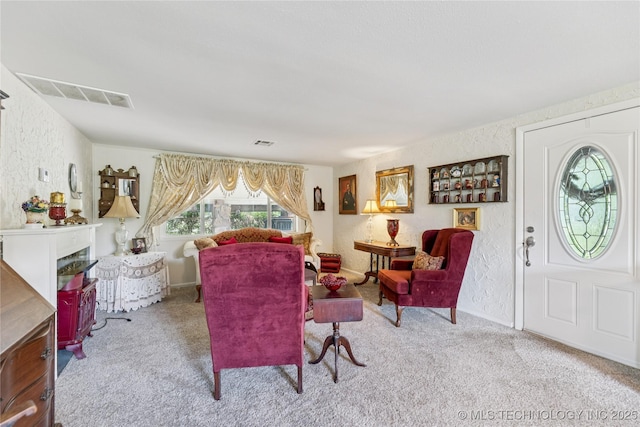 242 Weatherman St, Kellyville, OK 74039 - carpeted living room with a textured wall