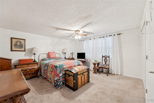 242 Weatherman St, Kellyville, OK 74039 - bedroom with carpet, ceiling fan, and a textured ceiling