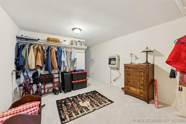 242 Weatherman St, Kellyville, OK 74039 - spacious closet featuring heating unit and carpet floors