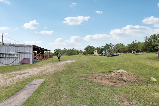 242 Weatherman St, Kellyville, OK 74039 - view of grassy yard with an outbuilding