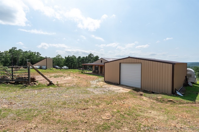3819 129th Rd, Panola, OK 74559 - view of yard with an outbuilding and driveway