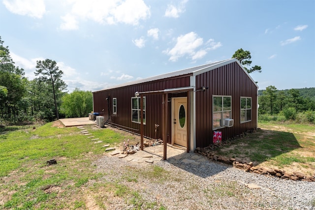 3819 129th Rd, Panola, OK 74559 - view of front of property with an outdoor structure, central AC unit, and cooling unit