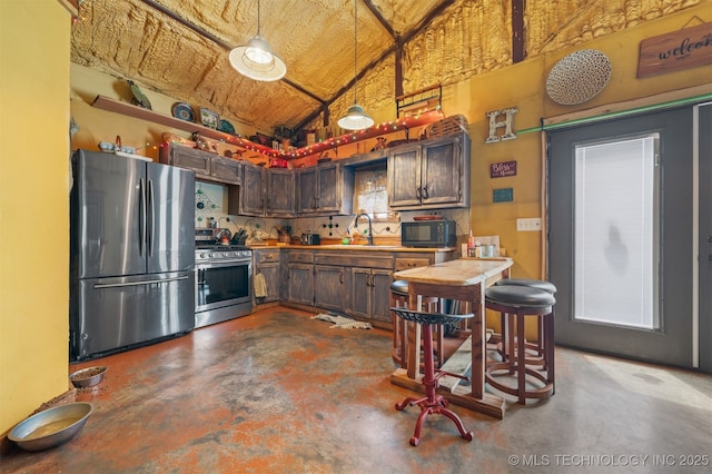 3819 129th Rd, Panola, OK 74559 - kitchen featuring stainless steel appliances, concrete floors, a sink, high vaulted ceiling, and light countertops