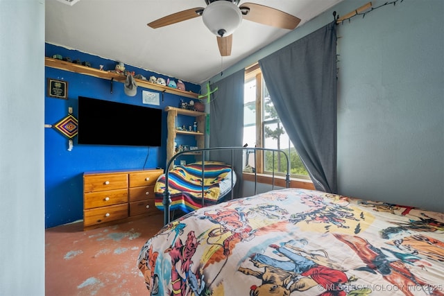 3819 129th Rd, Panola, OK 74559 - bedroom with a ceiling fan and concrete flooring