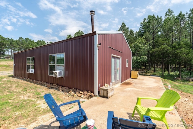 3819 129th Rd, Panola, OK 74559 - view of outdoor structure featuring french doors and cooling unit